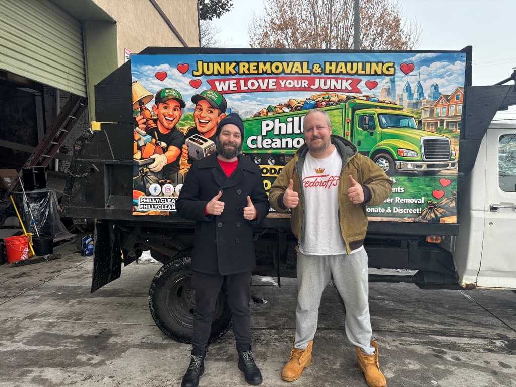 The Philly Cleanouts crew in front of our junk removal truck